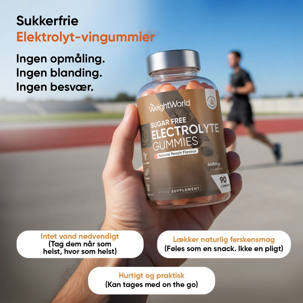 Sukkerfri WeightWorld elektrolytvindgummier i flaske, holdt i en hånd