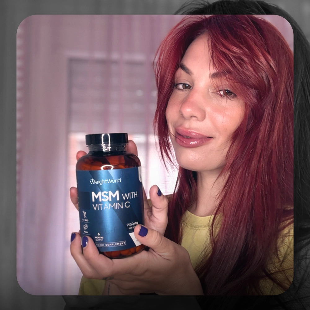 WeightWorld MSM og C-vitamin kosttilskudsflaske i kvindehånd