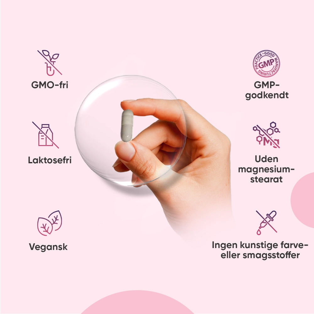 Tranebær-C-vitamintilskud: hånd holder kapsel ved flaske; GMO-fri og vegansk.